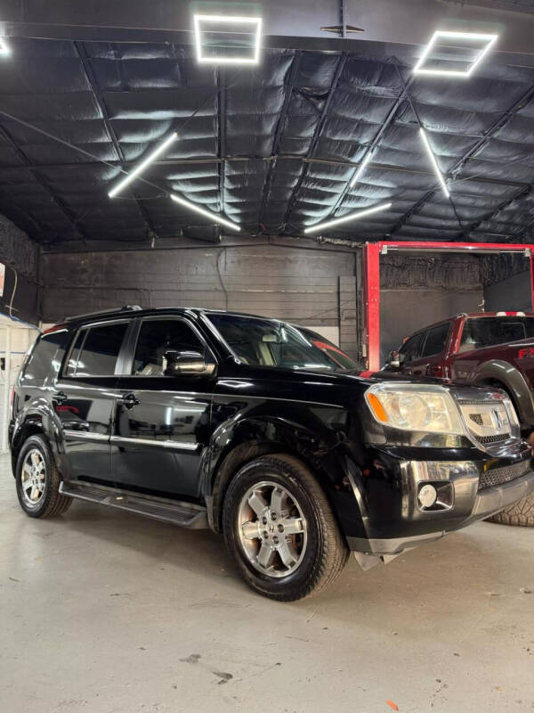 2009 Honda Pilot for sale at Mad Auto Sales in Orlando FL