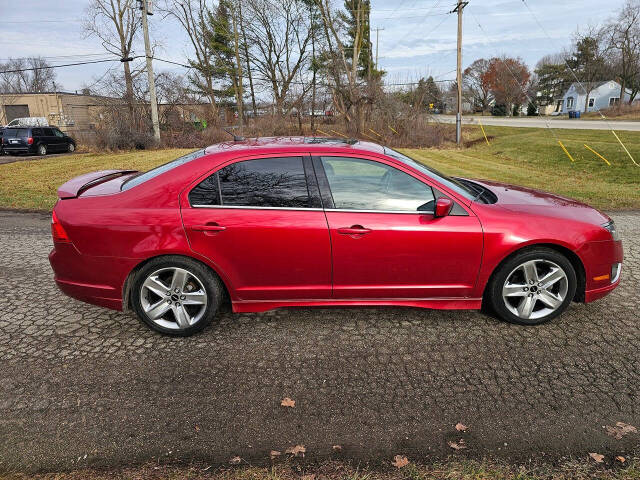 2011 Ford Fusion for sale at WAGNER AUTO MART LLC in Ann Arbor, MI