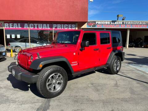 2010 Jeep Wrangler Unlimited for sale at Sanmiguel Motors in South Gate CA