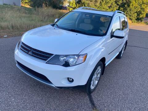 2009 Mitsubishi Outlander for sale at Blue Tech Motors in South Saint Paul MN