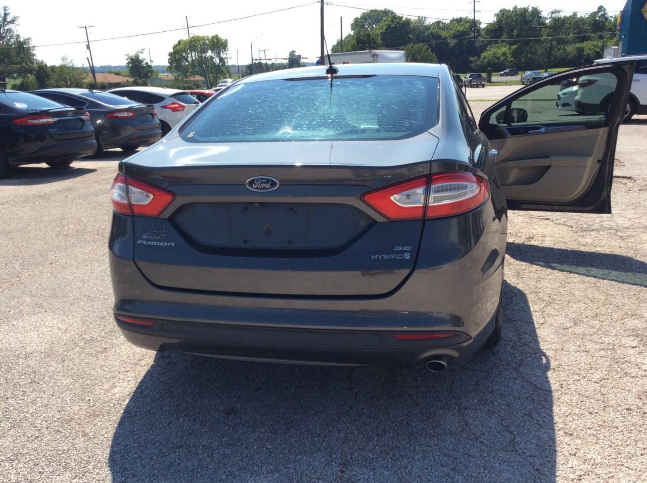 2016 Ford Fusion Hybrid for sale at SPRINGTIME MOTORS in Huntsville, TX