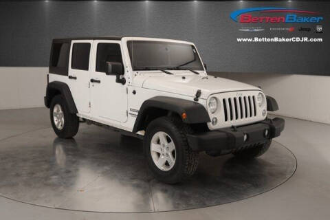 2015 Jeep Wrangler Unlimited for sale at Betten Baker Chrysler Dodge Jeep Ram in Lowell MI