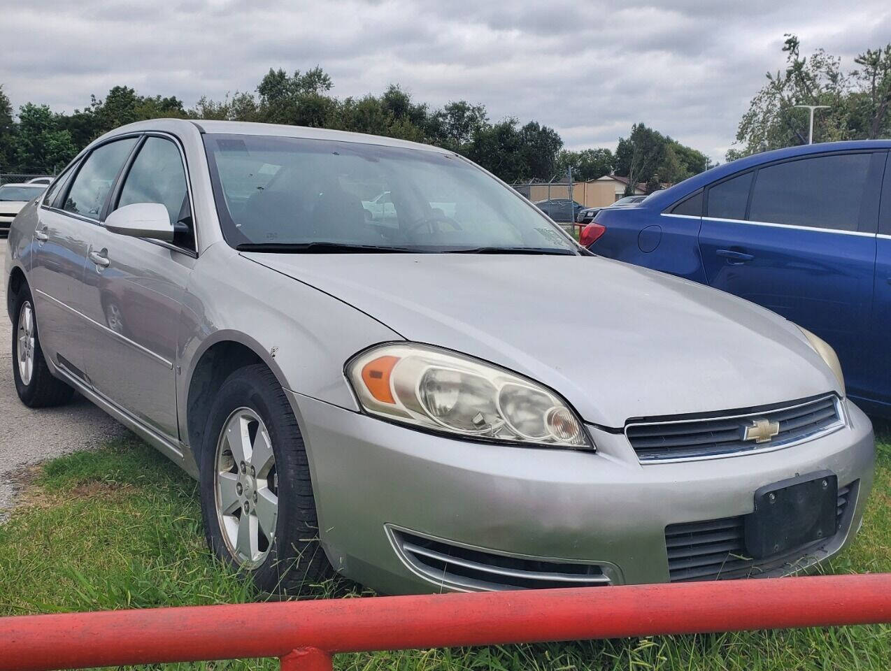 2009 Chevrolet Impala for sale at DURANGO AUTO CENTER LLC in Tulsa, OK