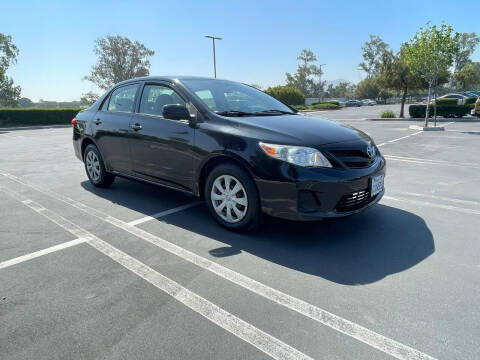 2011 Toyota Corolla for sale at E and M Auto Sales in Bloomington CA