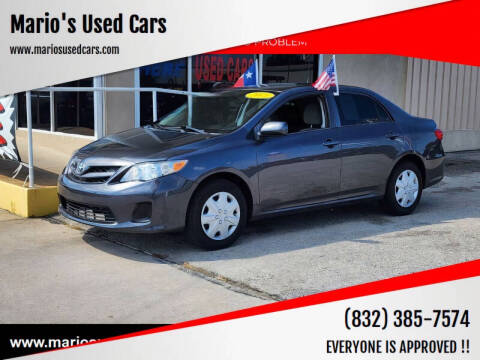 2013 Toyota Corolla for sale at Mario's Used Cars in Houston TX