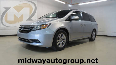 2015 Honda Odyssey for sale at Midway Auto Group in Addison TX