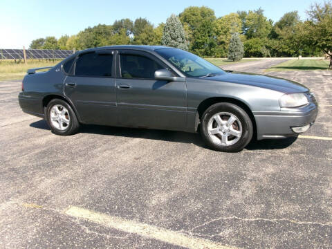 2005 Chevrolet Impala for sale at Crossroads Used Cars Inc. in Tremont IL