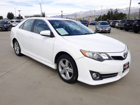 2012 Toyota Camry for sale at Auto Source in Banning CA