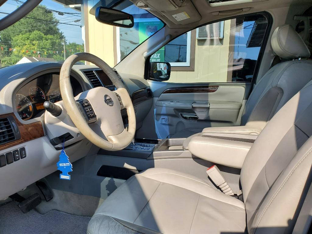 2010 Nissan Armada for sale at DAGO'S AUTO SALES LLC in Dalton, GA