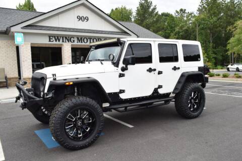 2015 Jeep Wrangler Unlimited for sale at Ewing Motor Company in Buford GA