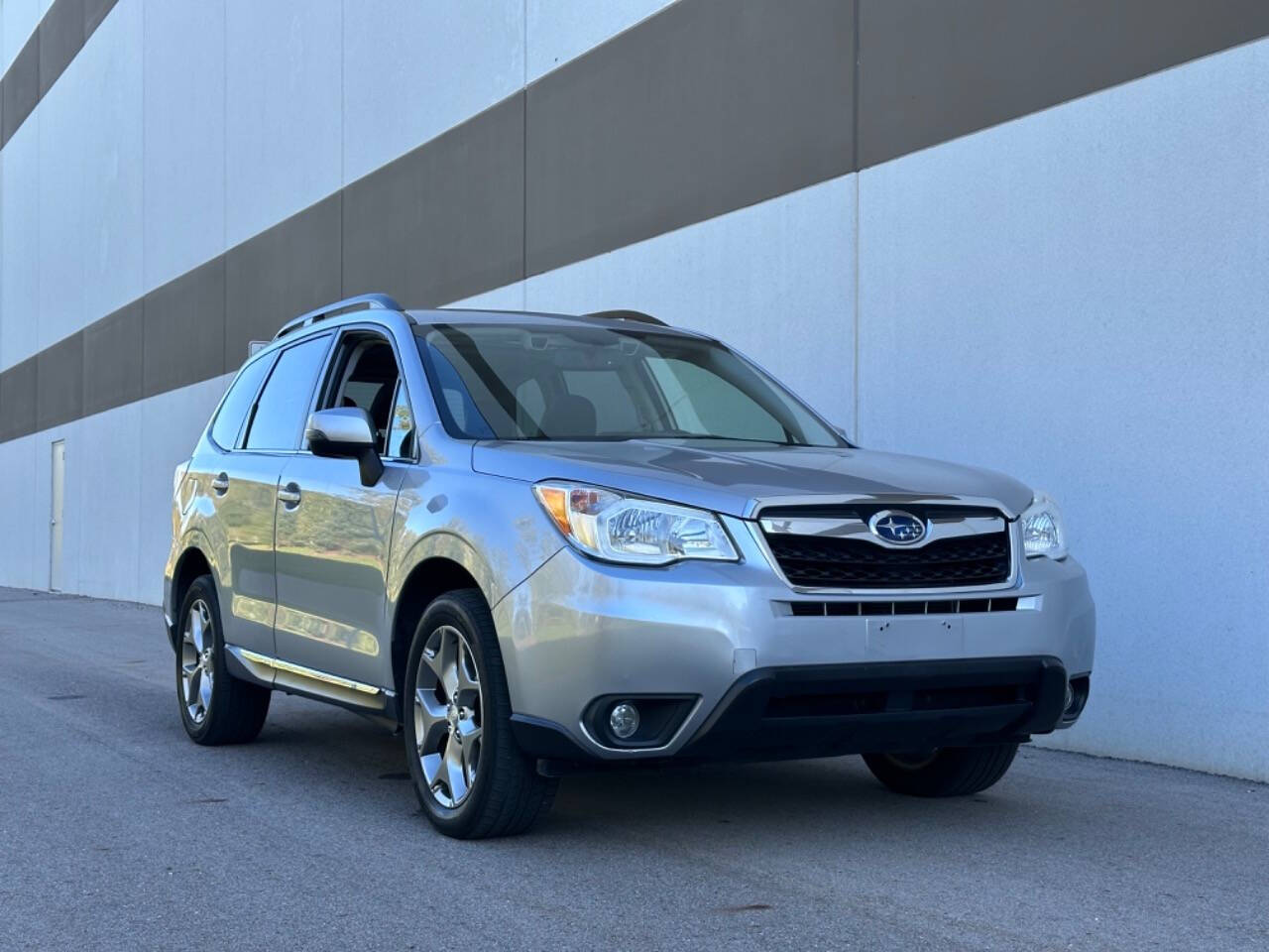 2016 Subaru Forester for sale at Phoenix Motor Co in Romulus, MI