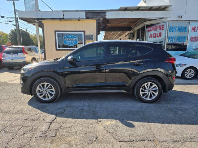 2016 Hyundai TUCSON for sale at DAGO'S AUTO SALES LLC in Dalton, GA