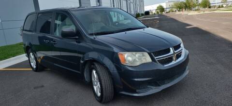 2013 Dodge Grand Caravan for sale at ACTION AUTO GROUP LLC in Roselle IL