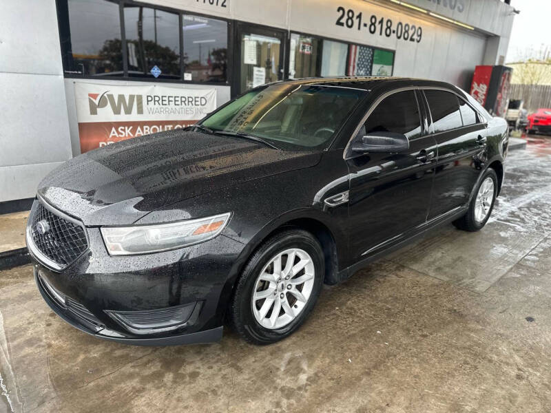 2013 Ford Taurus for sale at Buy-Fast Autos in Houston TX