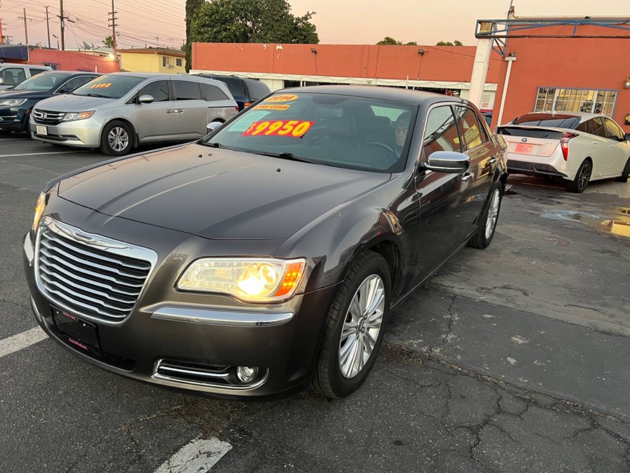 2014 Chrysler 300 for sale at Unique Auto Sales, Inc. in Bell, CA