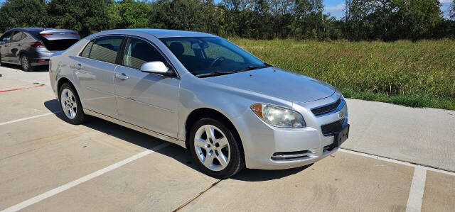 2010 Chevrolet Malibu for sale at CAR MARKET AUTO GROUP in Sugar Land, TX