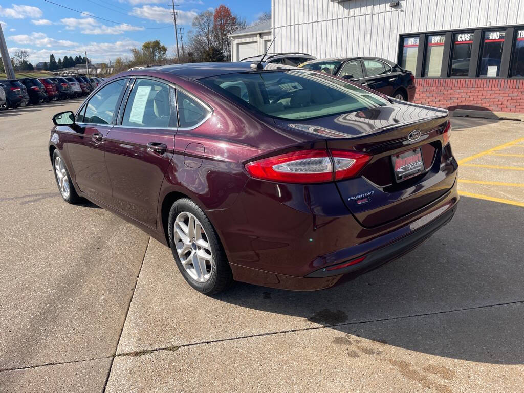 2013 Ford Fusion for sale at Martinson's Used Cars in Altoona, IA