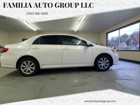 2013 Toyota Corolla for sale at Familia Auto Group LLC in Massillon OH