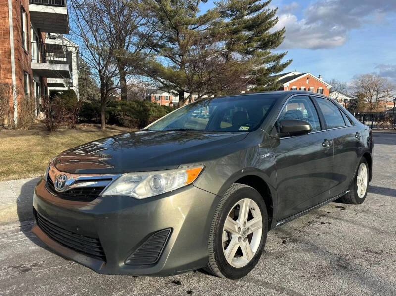 2014 Toyota Camry Hybrid for sale at CARLINES AUTO GROUP in Fredericksburg VA