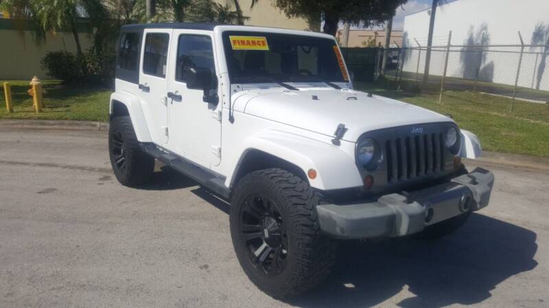 2013 Jeep Wrangler Unlimited for sale at BETHEL AUTO DEALER, INC in Miami FL