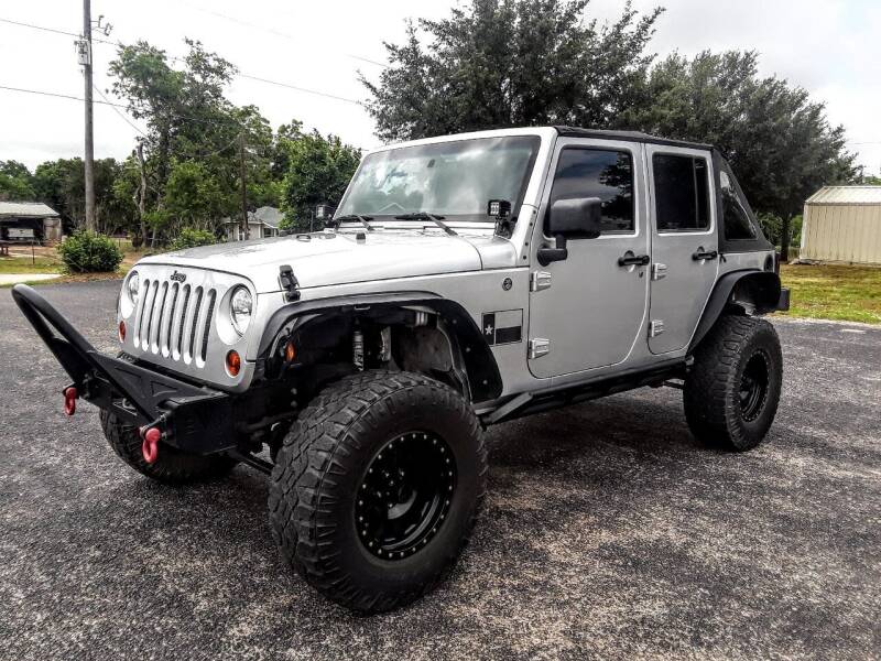 2012 Jeep Wrangler Unlimited for sale at Rons Auto Sales in Stockdale TX