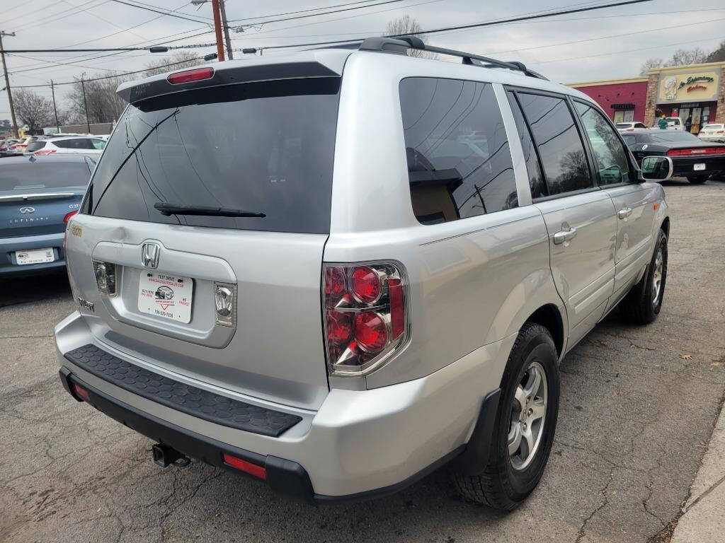 2007 Honda Pilot for sale at DAGO'S AUTO SALES LLC in Dalton, GA