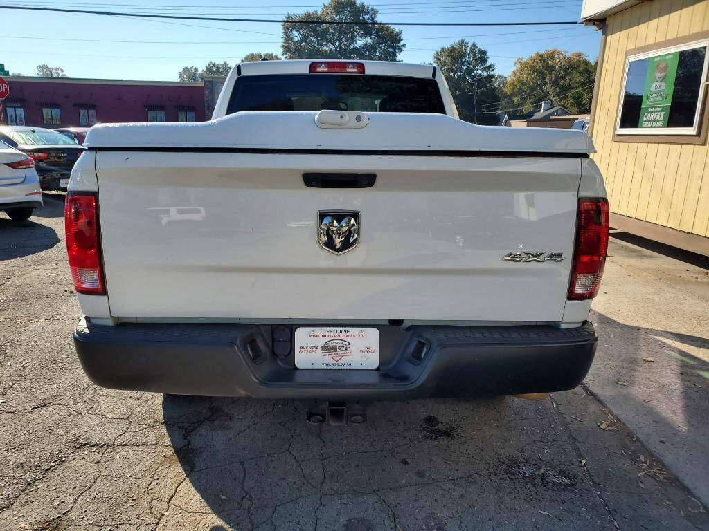 2014 Ram 1500 for sale at DAGO'S AUTO SALES LLC in Dalton, GA