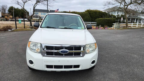 2009 Ford Escape for sale at ACTION WHOLESALERS in Copiague NY