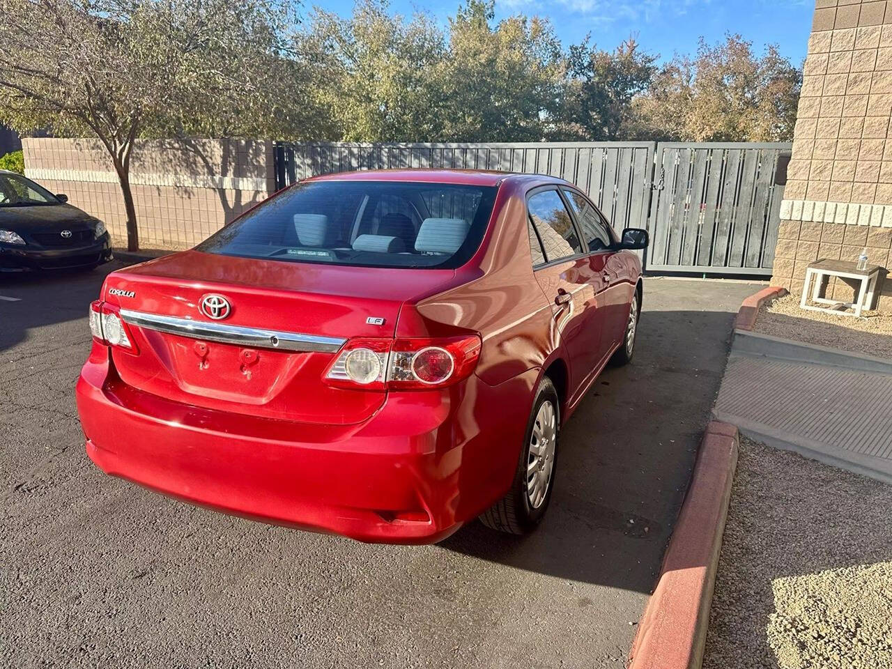 2013 Toyota Corolla for sale at HUDSONS AUTOS in Gilbert, AZ