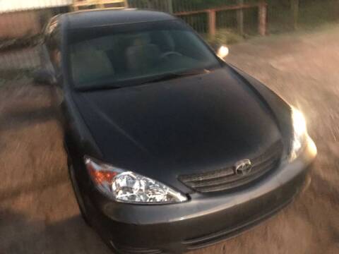 2002 Toyota Camry for sale at Suave Motors in Houston TX
