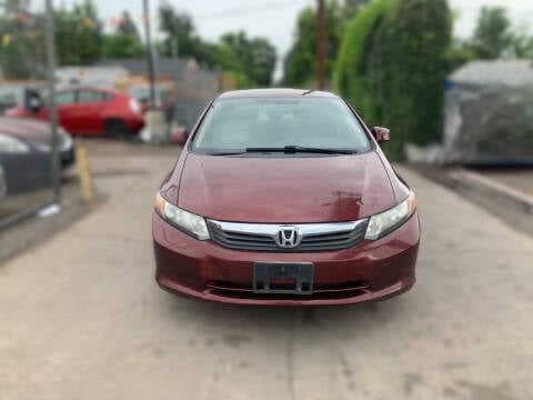 2012 Honda Civic for sale at Queen Auto Sales in Denver CO