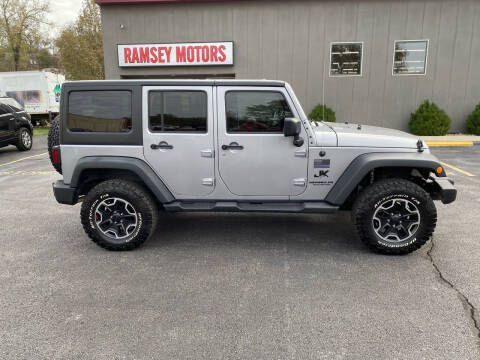 2015 Jeep Wrangler Unlimited for sale at Ramsey Motors in Riverside MO