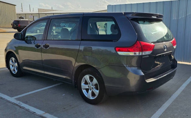 2014 Toyota Sienna for sale at CAR MARKET AUTO GROUP in Sugar Land, TX