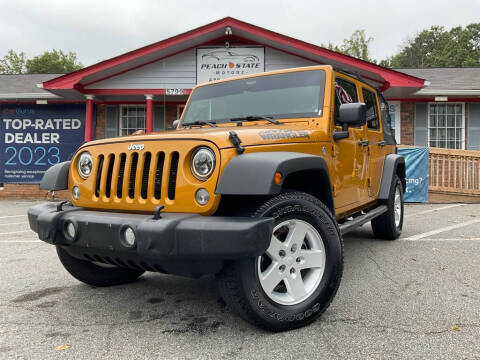 2014 Jeep Wrangler Unlimited for sale at Peach State Motors Inc in Acworth GA