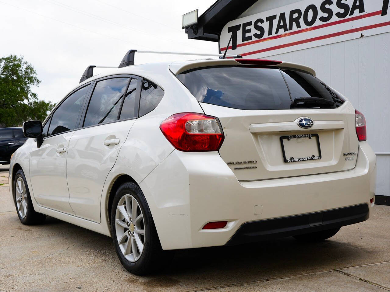 2014 Subaru Impreza for sale at Testarossa Motors in League City, TX