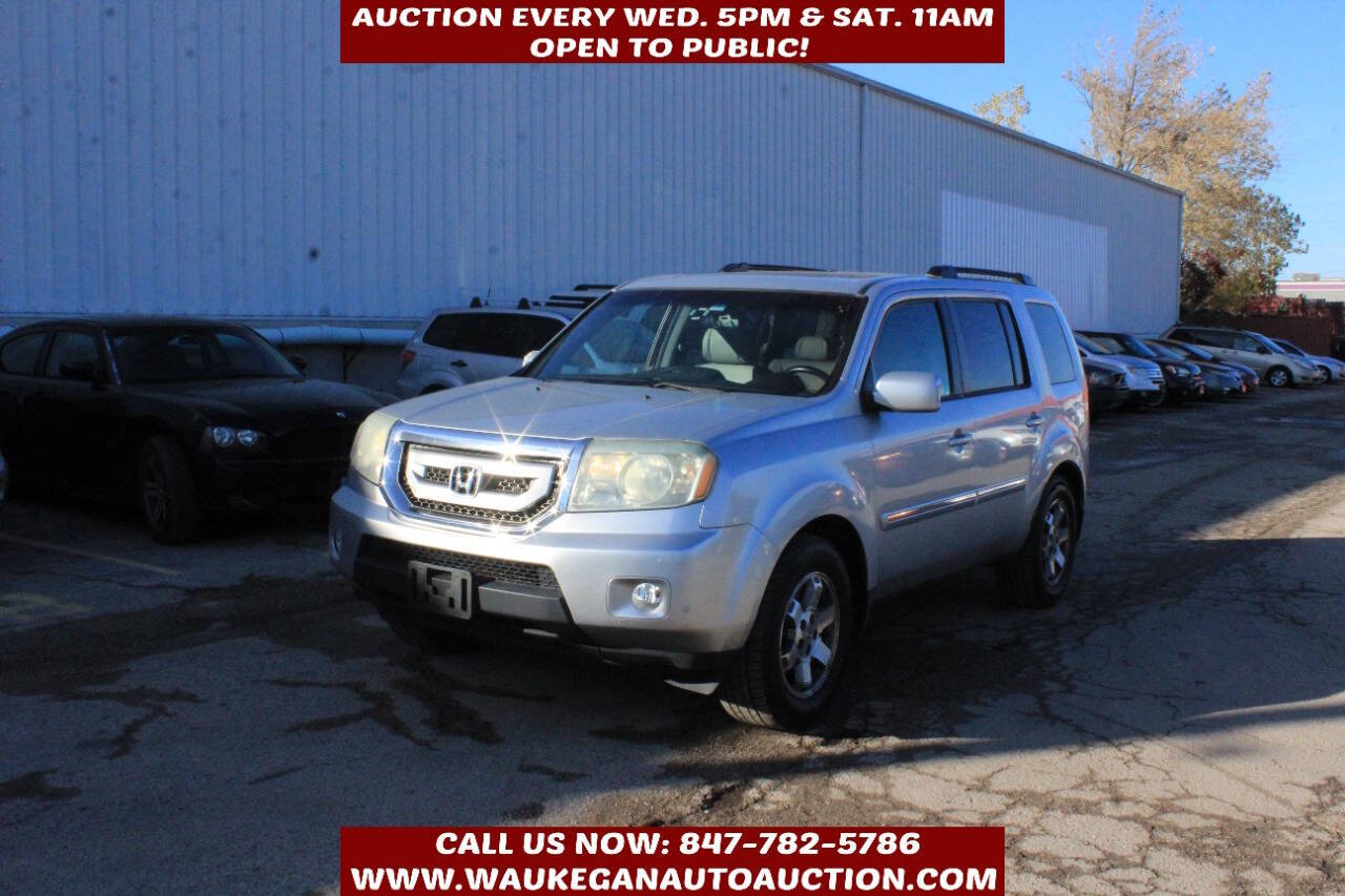 2010 Honda Pilot Touring w/Navi w/DVD 4dr SUV and DVD's photo