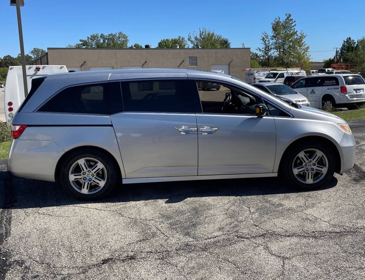 2011 Honda Odyssey for sale at HEARTLAND AUTO SALES in Indianapolis, IN