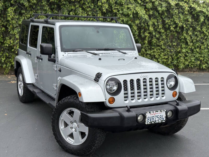 Used 2007 Jeep Wrangler Unlimited Sahara with VIN 1J4GA59167L156700 for sale in Sacramento, CA
