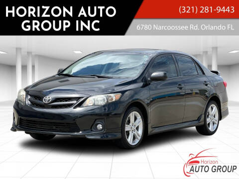 2013 Toyota Corolla for sale at HORIZON AUTO GROUP INC in Orlando FL