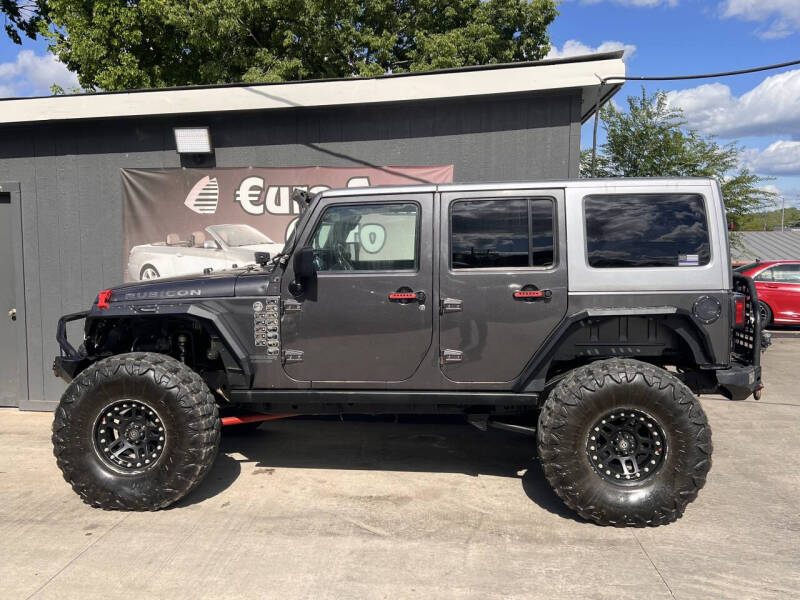 Used 2014 Jeep Wrangler Unlimited Rubicon with VIN 1C4BJWFG2EL230769 for sale in Kansas City