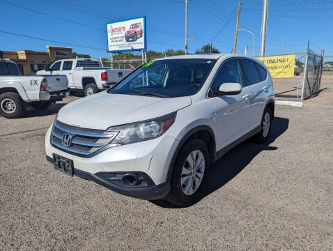 2014 Honda CR-V for sale at AUGE'S SALES AND SERVICE in Belen NM
