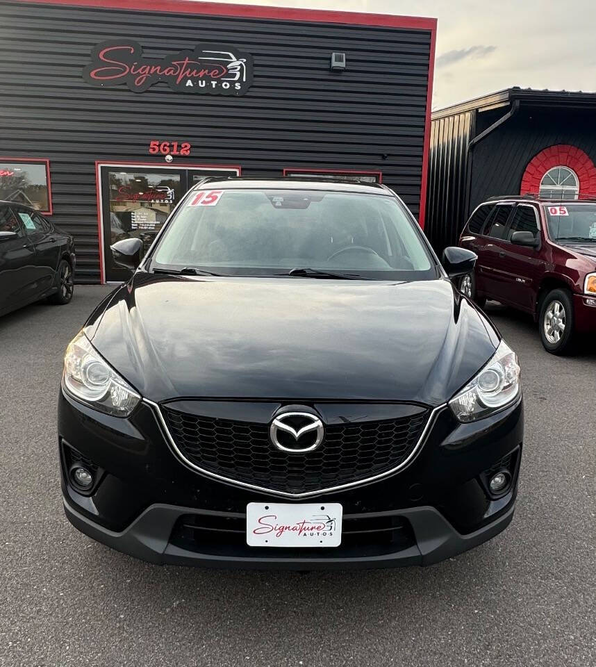 2015 Mazda CX-5 for sale at SIGNATURE AUTOS LLC in Weston, WI