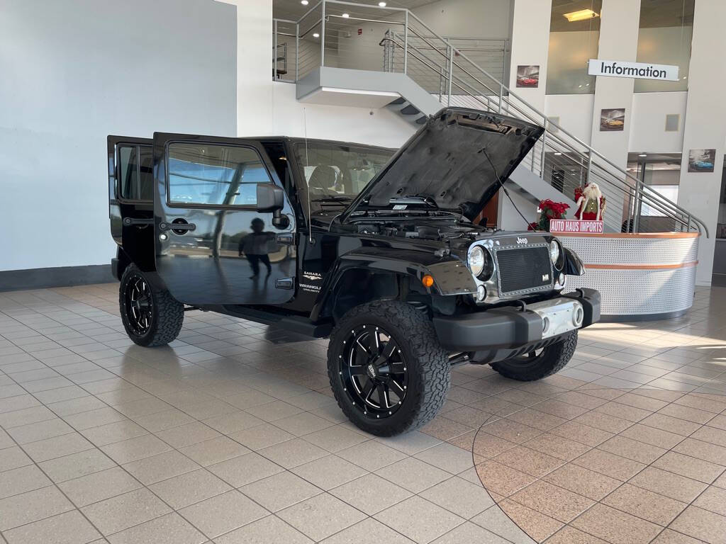 2014 Jeep Wrangler Unlimited for sale at Auto Haus Imports in Grand Prairie, TX