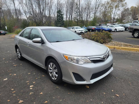 2014 Toyota Camry for sale at Fleet Automotive LLC in Maplewood MN