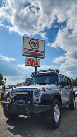 2011 Jeep Wrangler Unlimited for sale at Automania in Dearborn Heights MI