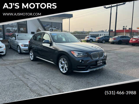 2015 BMW X1 for sale at AJ'S MOTORS in Omaha NE