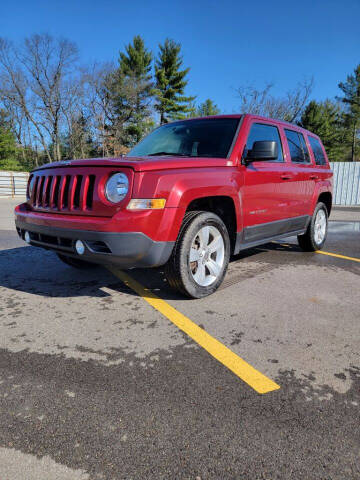 2015 Jeep Patriot for sale at Hilltop Auto in Clare MI