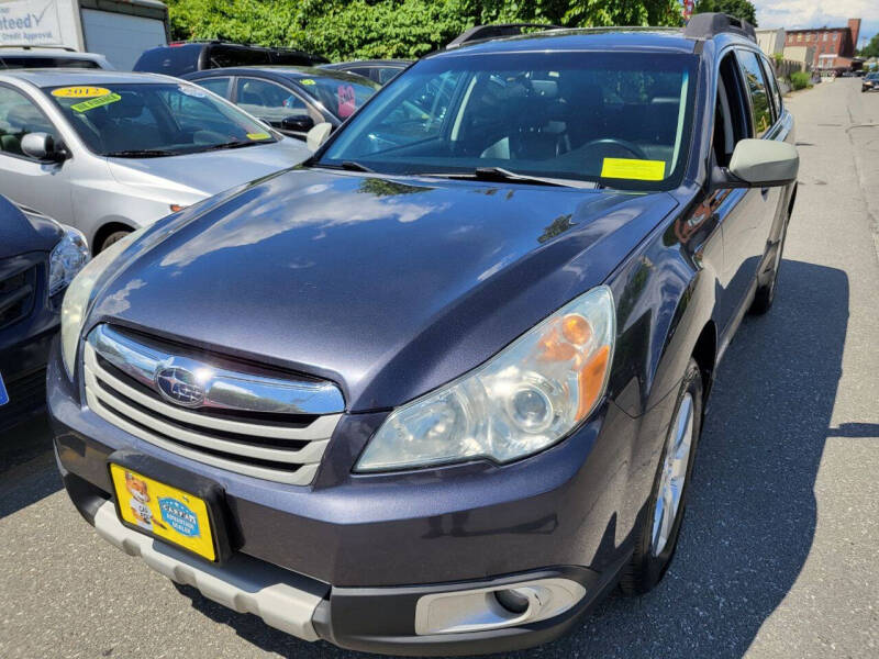 2011 Subaru Outback for sale at Howe's Auto Sales in Lowell MA