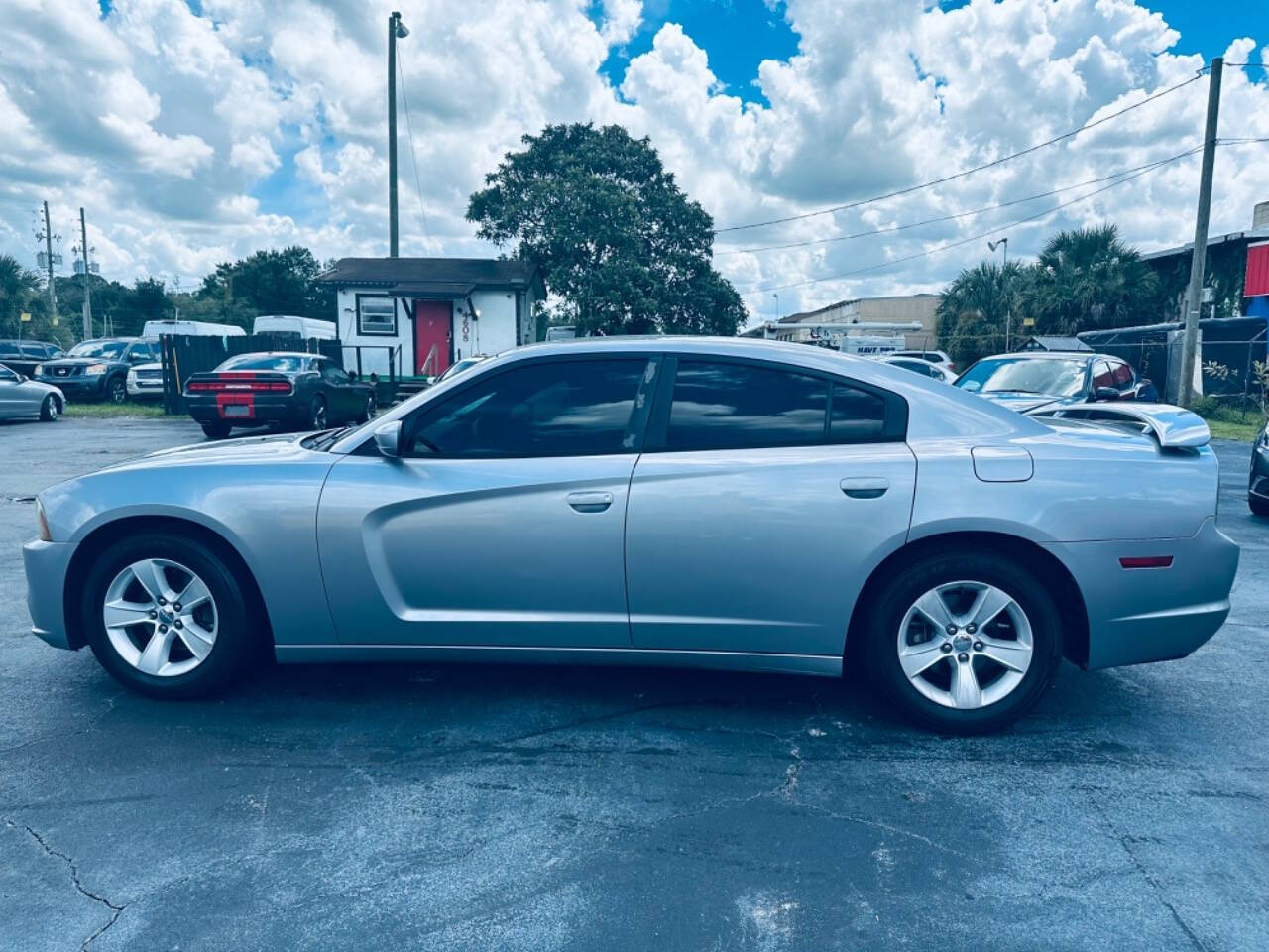 2013 Dodge Charger for sale at NOVA AUTO SALES in Orlando, FL