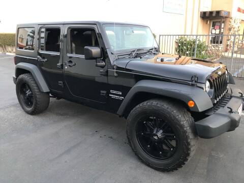 2015 Jeep Wrangler Unlimited for sale at Carmelo Auto Sales Inc in Orange CA